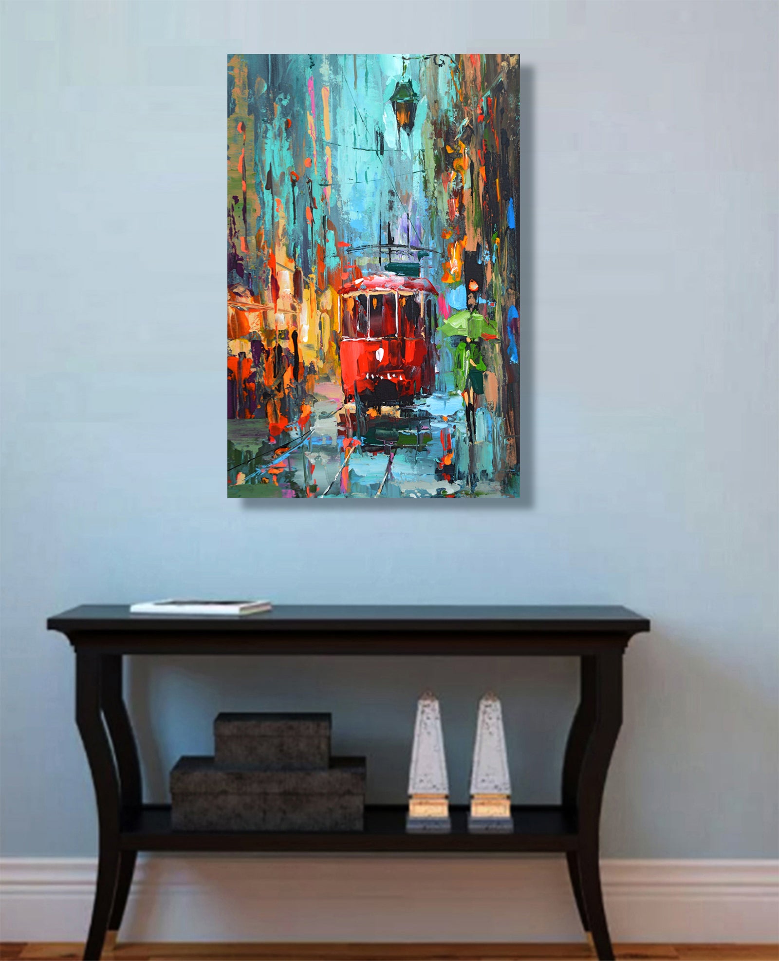 A rainy evening painting with a woman with umbrella and a tram