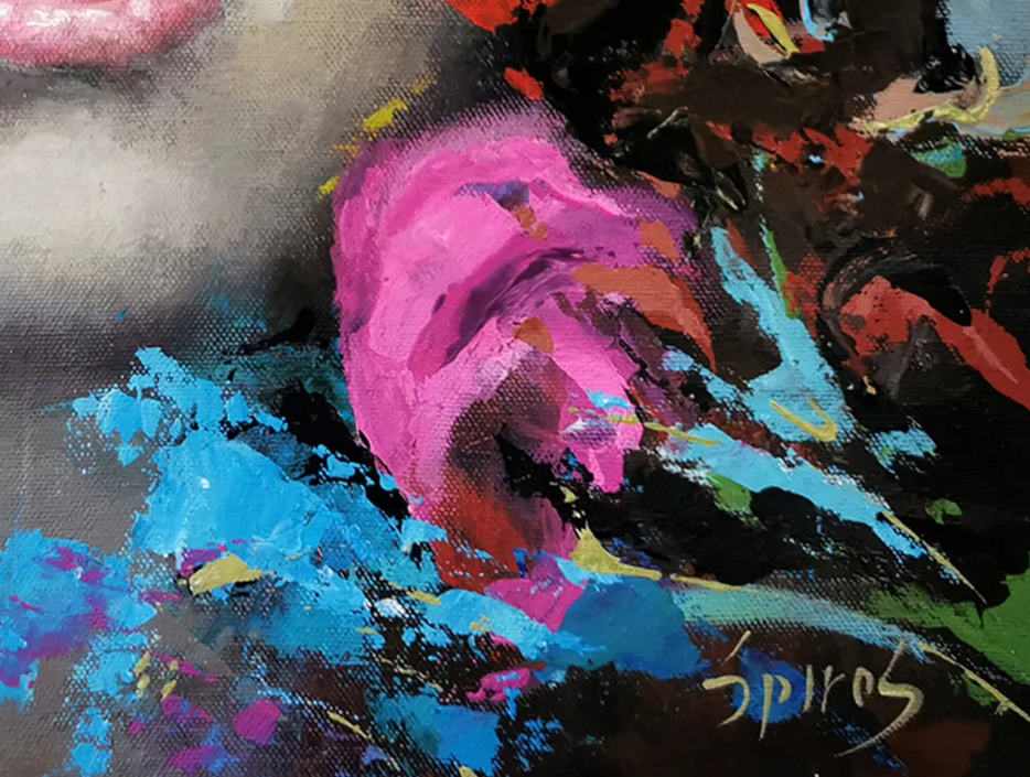 Close-up detail of colorful floral elements in woman portrait painting