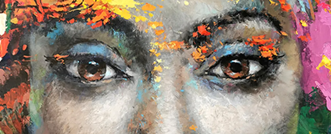 Close-up of expressive eyes in colorful African woman portrait painting