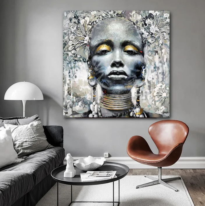 African woman portrait painting displayed in a modern living room