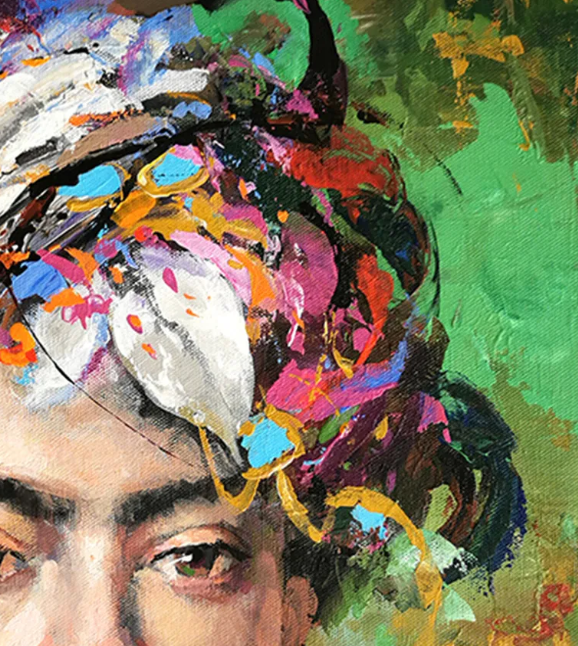 Close-up focusing on the woman's eyes, colorful textures, and artistic details in the portrait.