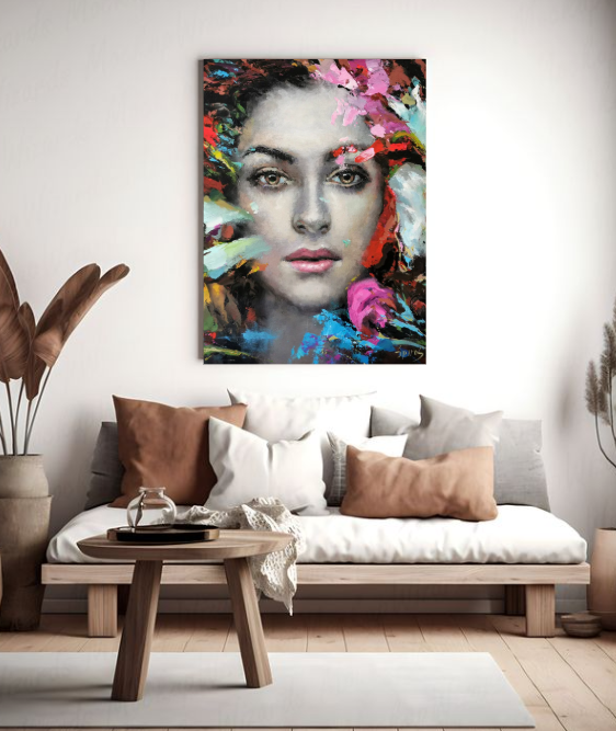 Colorful woman portrait painting displayed in a modern living room interior
