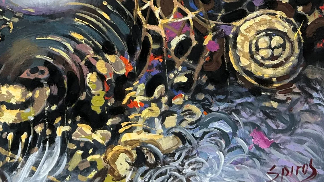 Close-up texture detail of colorful female portrait painting on canvas
