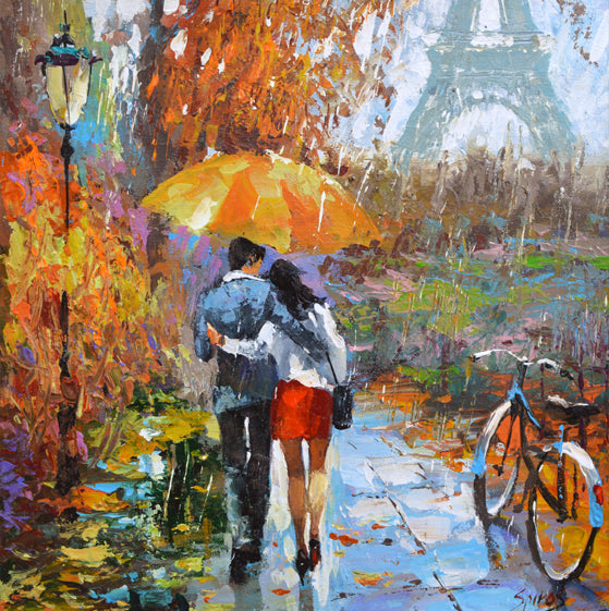 couple, lovers under an umbrella in Paris