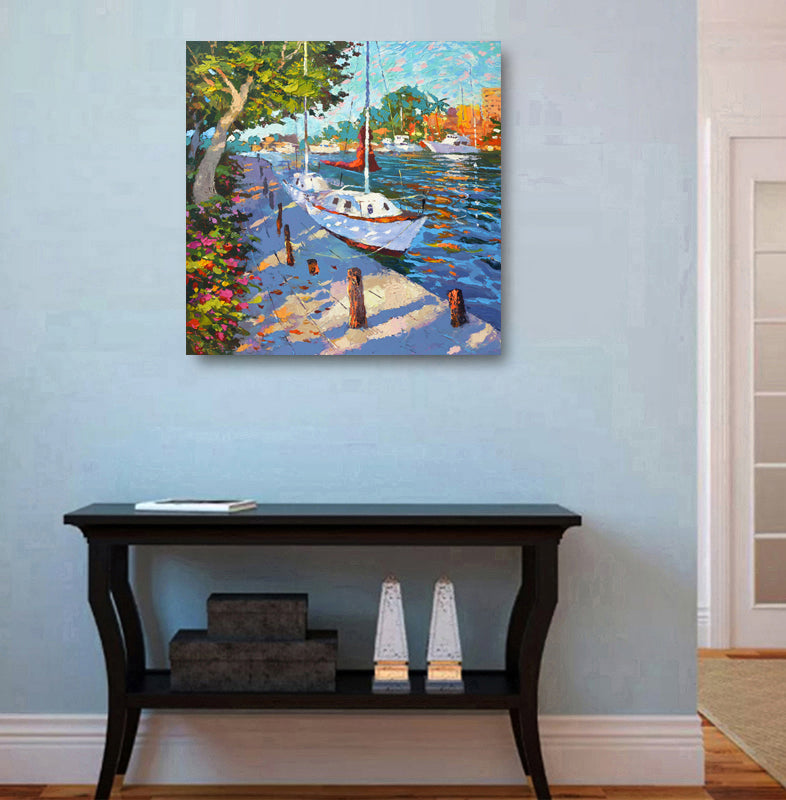 Tropical harbor evening painting displayed in home interior