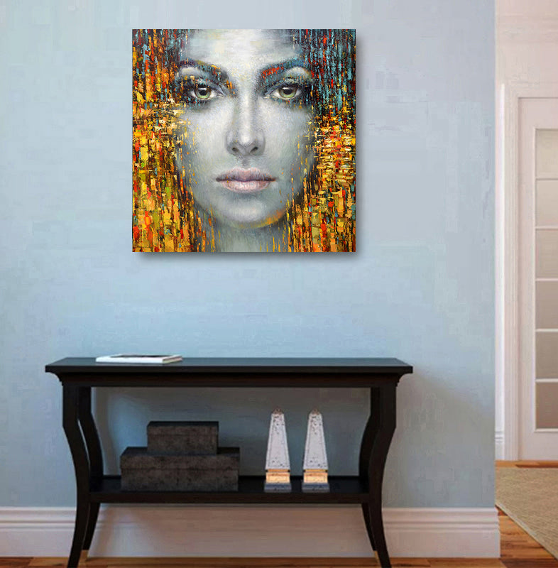 Woman face portrait painting displayed in modern interior